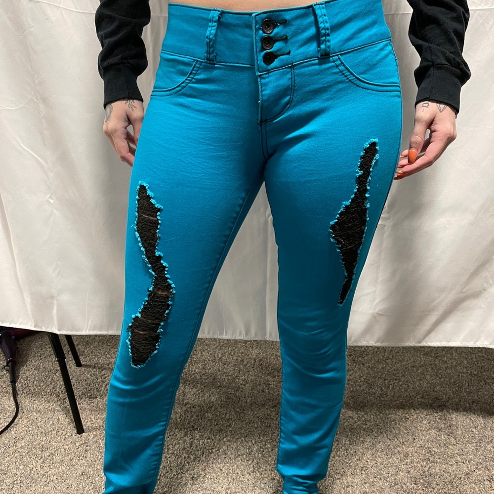 Teal skinny jeans
